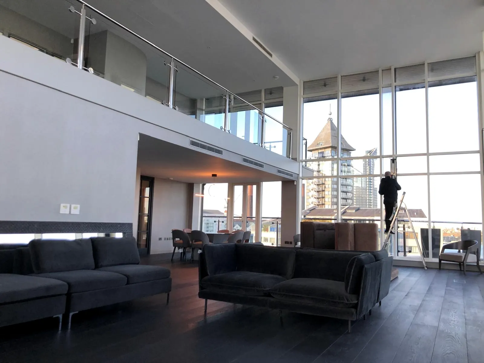 Prime London penthouse living area with tall windows